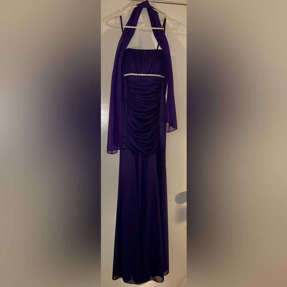Fanny Fashion Royal Purple, fitted from the waist up and lose from waist down.